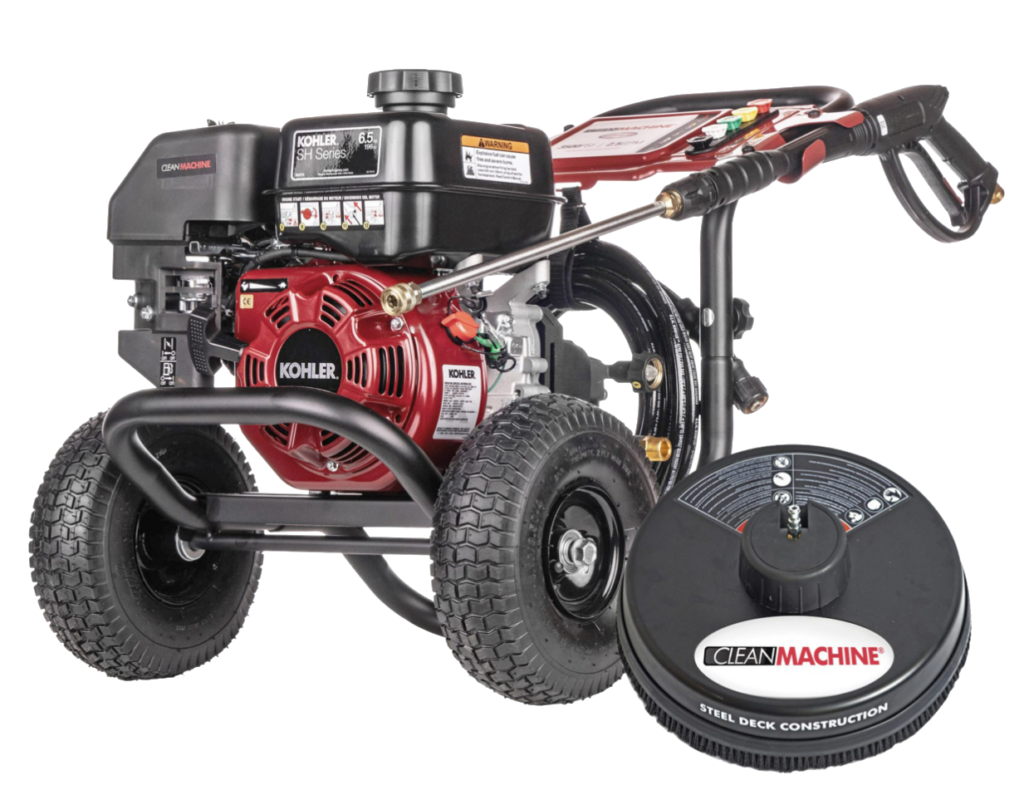 Gas-powered Clean Machine pressure washer with Kohler SH Series 6.5 hp engine, large wheels, high‑pressure hose, spray gun, and a steel‑deck surface cleaner attachment in front.