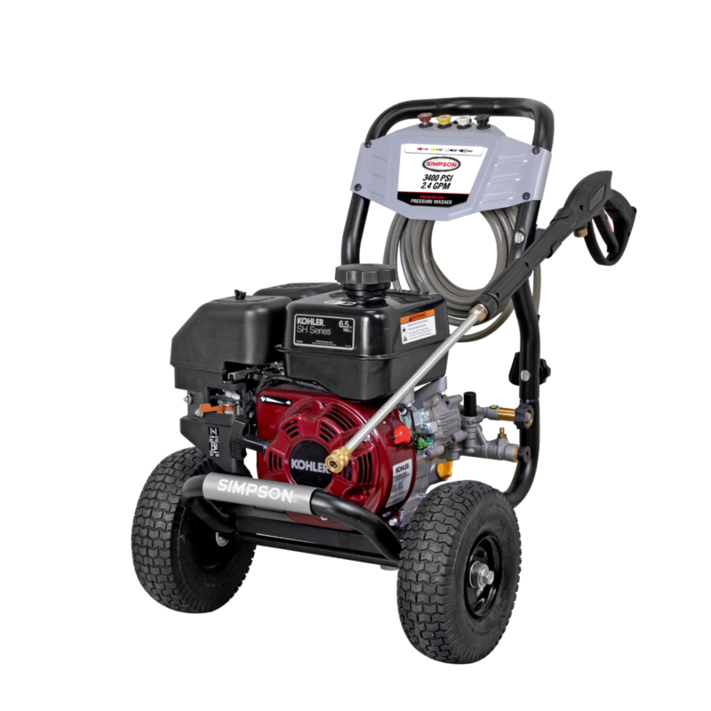 Simpson MegaShot MS61124 gas pressure washer featuring a red-shrouded Kohler SH Series engine, OEM Technologies axial cam pump, black welded steel frame, and 10-inch pneumatic tires on a black background.