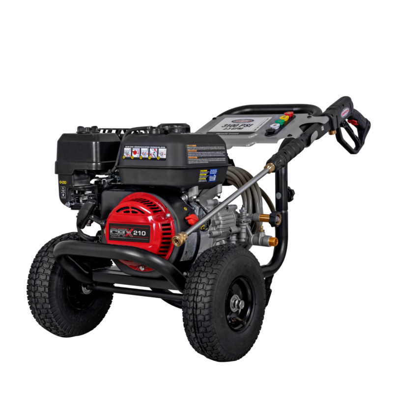 Simpson MegaShot MS61217 gas pressure washer featuring a red CRX210 engine, OEM Technologies axial cam pump, silver welded steel frame, and 10-inch pneumatic tires on a black background.