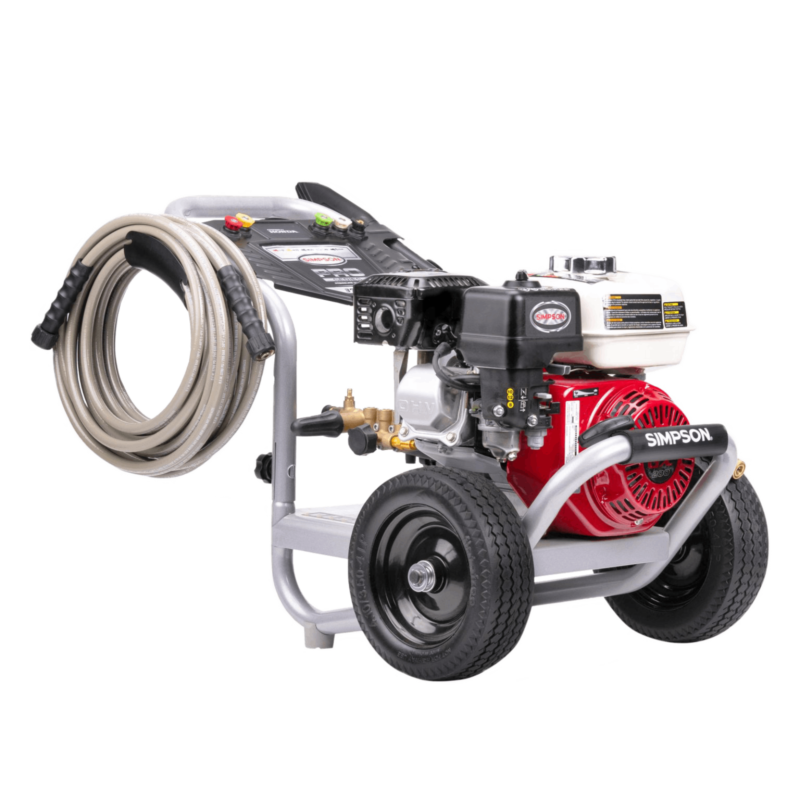 Simpson Pro Series PS60982 with a red Honda GX200 engine, direct-drive AAA triplex plunger pump, silver welded steel frame, and 10-inch premium pneumatic tires.