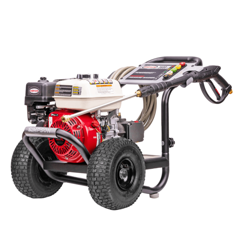 Simpson PowerShot PS60995 professional gas pressure washer featuring a red Honda GX200 engine, a direct-drive AAA triplex plunger pump, a black powder-coated steel frame, an integrated silver dashboard console, and 10-inch premium pneumatic tires on a black background.