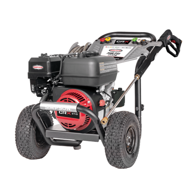 Alt Text: Simpson PowerShot PS61253 gas pressure washer featuring a red-shrouded CRX210 engine, an AAA AX300 Pro axial cam pump, a black powder-coated steel frame, a silver dashboard console, and 10-inch premium pneumatic tires on a black background.